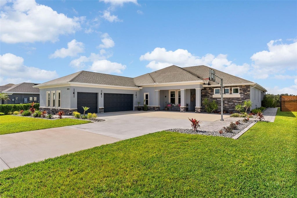 Photo of 5118 Lake Toscana Drive, Wimauma, FL 33598 (MLS # TB8549969)
