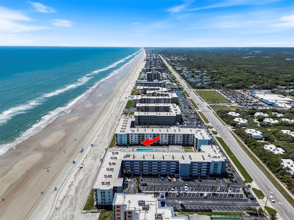 Photo of 4153 S Atlantic Avenue #107, New Smyrna Beach, FL 32169 (MLS # O6408518)