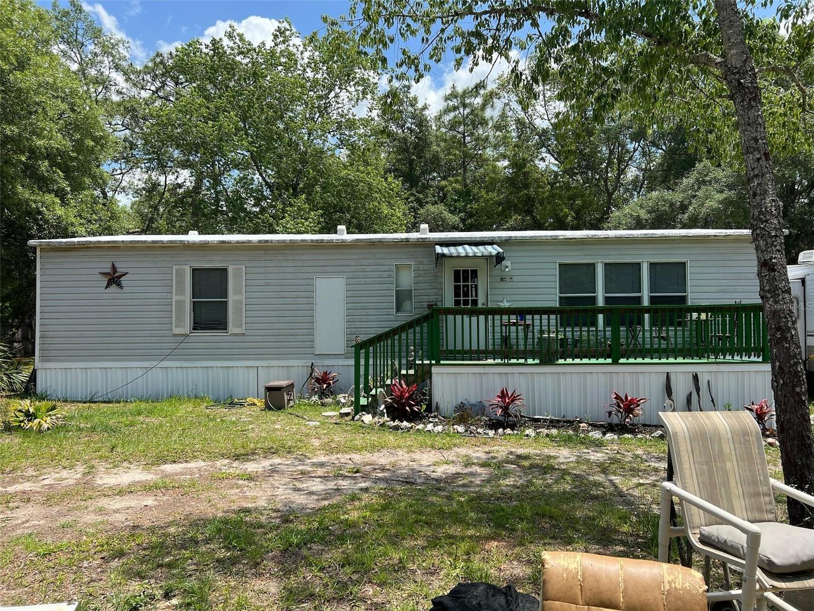 Discover this charming mobile home situated in the serene setting of Lecanto, FL. This property features a spacious layout with multiple bedrooms and bathrooms, providing ample comfort. Enjoy the open living area that flows seamlessly into a well-equipped kitchen. The exterior offers a generous yard space appropriate for outdoor activities. Conveniently located near local amenities, this home provides a wonderful opportunity for relaxed living.