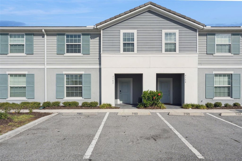 Photo of 7163 Oakmoss Loop, Davenport, FL 33837 (MLS # O6447952)