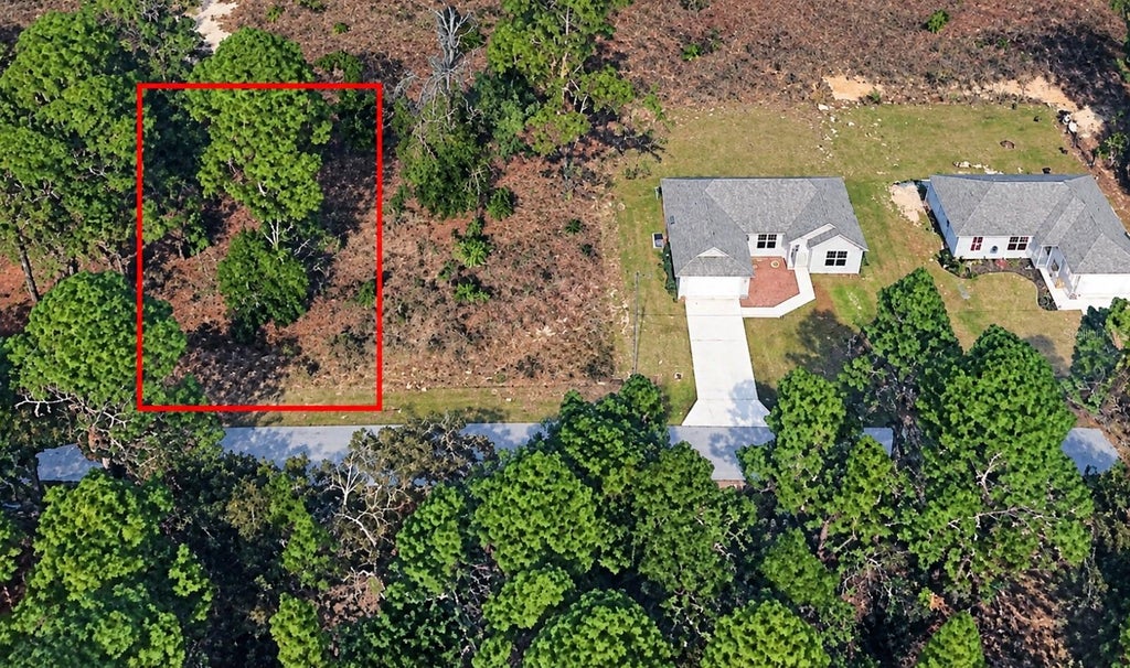 Photo of 415 W Homeway Loop, Citrus Springs, FL 34434 (MLS # O6452926)
