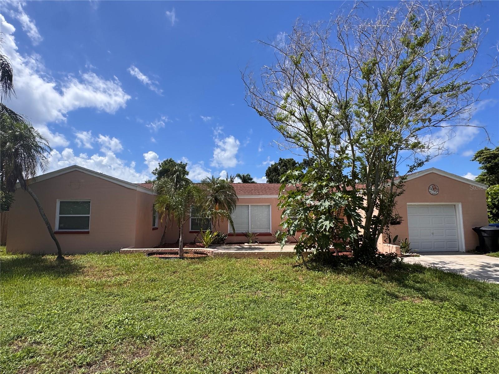 This home is located in the Bahama Shores area of St. Pete which sits on 1/4 acre of land. This waterfront neighborhood contains tree canopied and brick lined streets. The neighborhood association owns a private waterfront park for the use of its residents. It is close to downtown St. Pete where you will find plenty of shopping and restaurants as well as easy access to the interstate. There is a formal living/dining room with beautiful floors and the kitchen is fully updated with chestnut finish wood cabinets, stainless steal appliances, granite counter tops, under cabinet lighting and two pantries. The family room features crown molding and tile flooring. Both bedrooms have walk in closets. This is a fantastic opportunity to rent a home in a tropical paradise. $100 administrative fee will be charged upon approval.