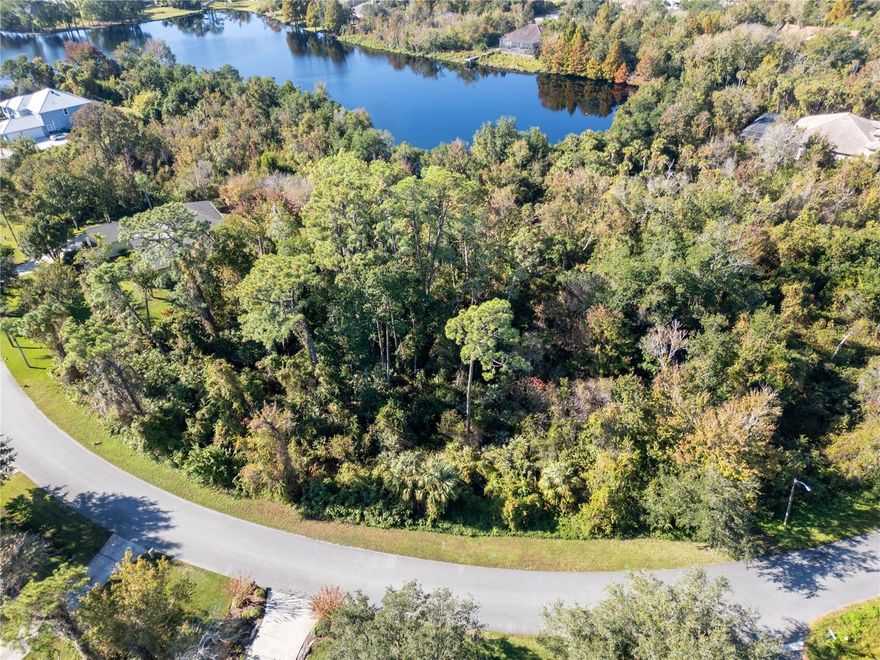 Create your ideal Florida retreat on this beautiful 1-acre lot in the serene and highly desirable Rambling Acres West community. Surrounded by mature trees and well-maintained homes, this property offers the space, privacy, and natural landscape that make the neighborhood so special.Backing to reserved land with a peaceful pond view, the homesite offers a quiet, protected setting where you can design the lifestyle you’ve been dreaming of—whether that’s a custom home with a wraparound porch, a garden, or a workshop. With city water available, underground utilities, and a low monthly HOA, the lot combines convenience with long-term value.Just minutes from Fox Lake Park, you’ll enjoy easy access to kayaking, fishing, nature trails, and community events. Plus, you’re in the heart of a region energized by the rapidly growing space program, offering both opportunity and excitement while still maintaining the slow-paced charm Titusville is known for.Come walk the property and imagine the possibilities—3827 Rambling Acres offers the perfect blend of privacy, nature, and proximity to everything the Space Coast has to offer.