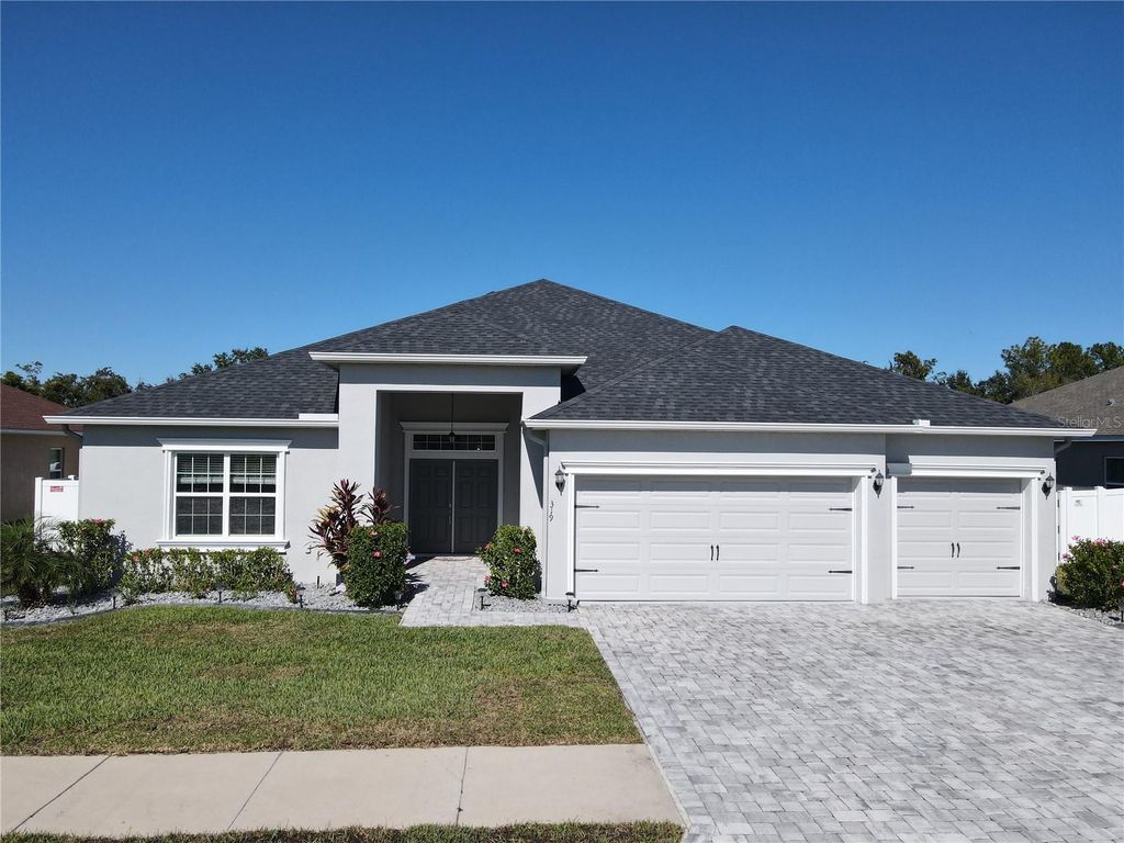 Photo of 319 Travelers Creek Drive, Auburndale, FL 33823 (MLS # S5138685)