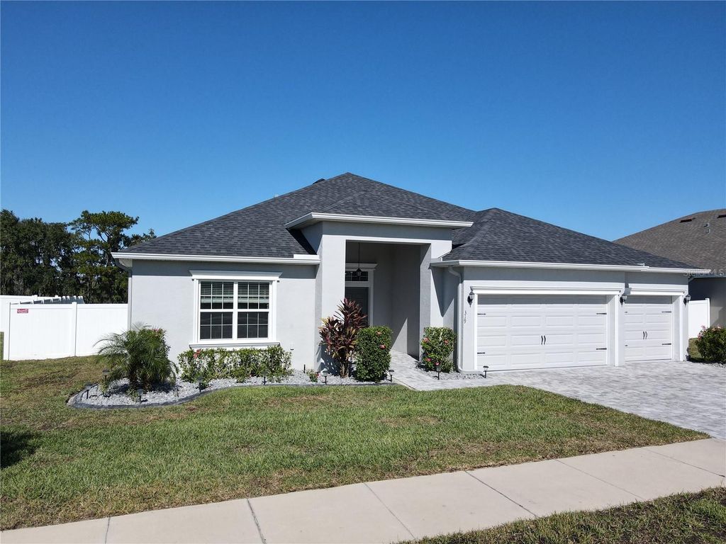 Photo of 319 Travelers Creek Drive, Auburndale, FL 33823 (MLS # S5138685)