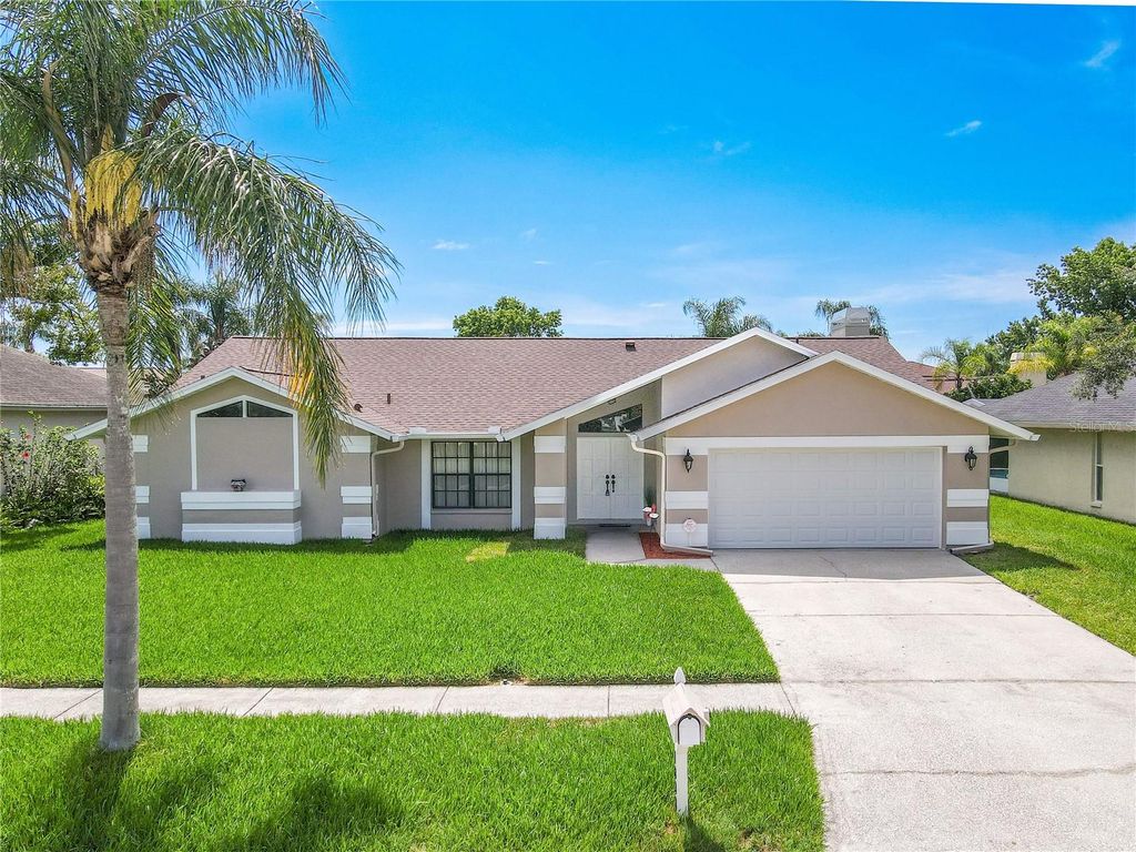 Photo of 1838 Eagle Ridge Boulevard, Palm Harbor, FL 34685 (MLS # TB8392103)