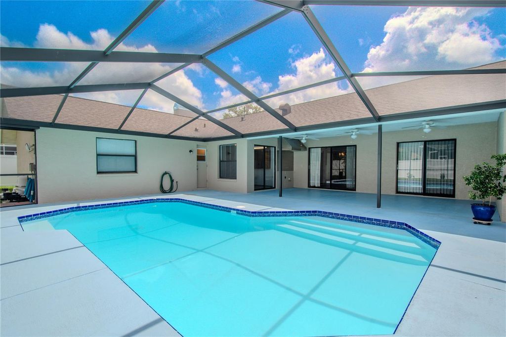 Photo of 1838 Eagle Ridge Boulevard, Palm Harbor, FL 34685 (MLS # TB8392103)