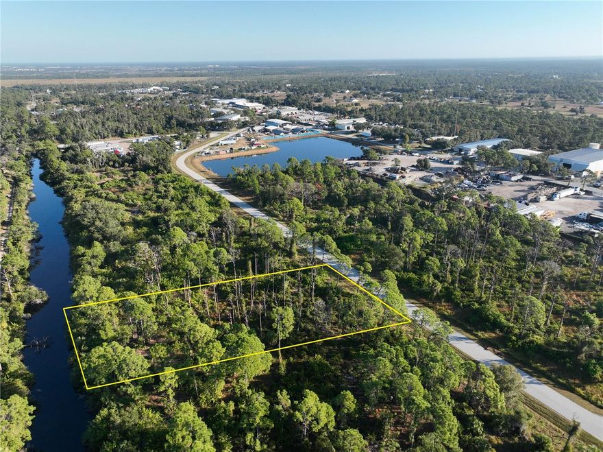 This industrial vacant lot is located in the Morris Industrial Park in Englewood, FL, positioned between Englewood and the new Wellen Park community. Centrally located just off U.S. 41 and Interstate 75, this approximately one-acre site offers endless opportunities and potential uses. The current owner has available plans for a six-unit, high-end custom storage facility/man-cave project. The seller may consider creative financing and/or a trade for the build-out of one of the units should an investor or investment group be interested.