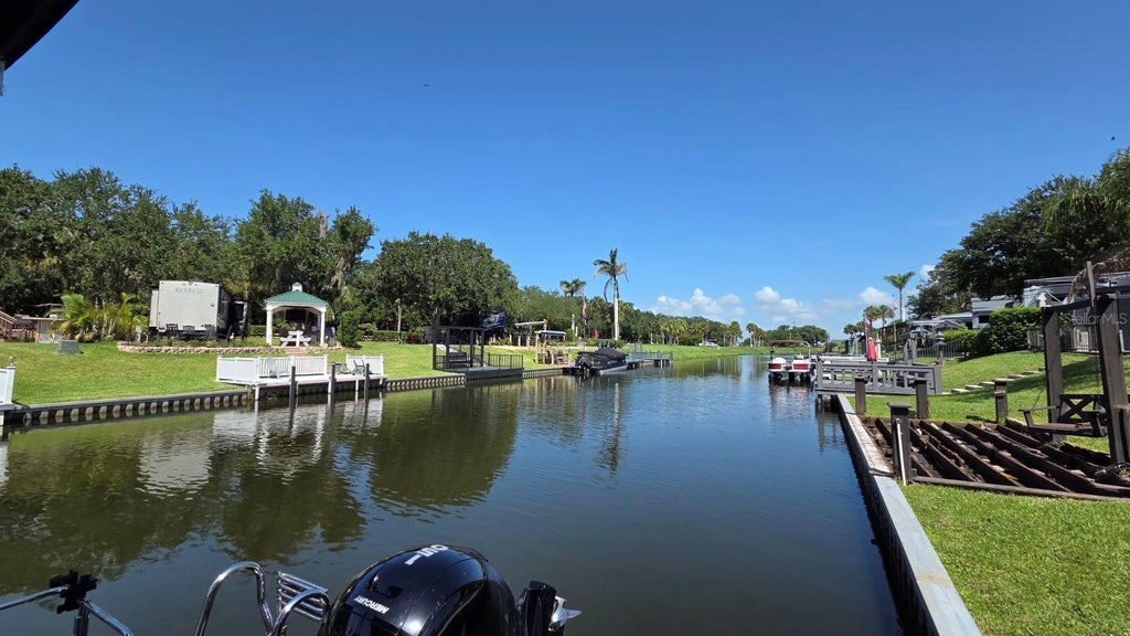 Photo of 579 Waterway Drive, River Ranch, FL 33867 (MLS # TB8524842)