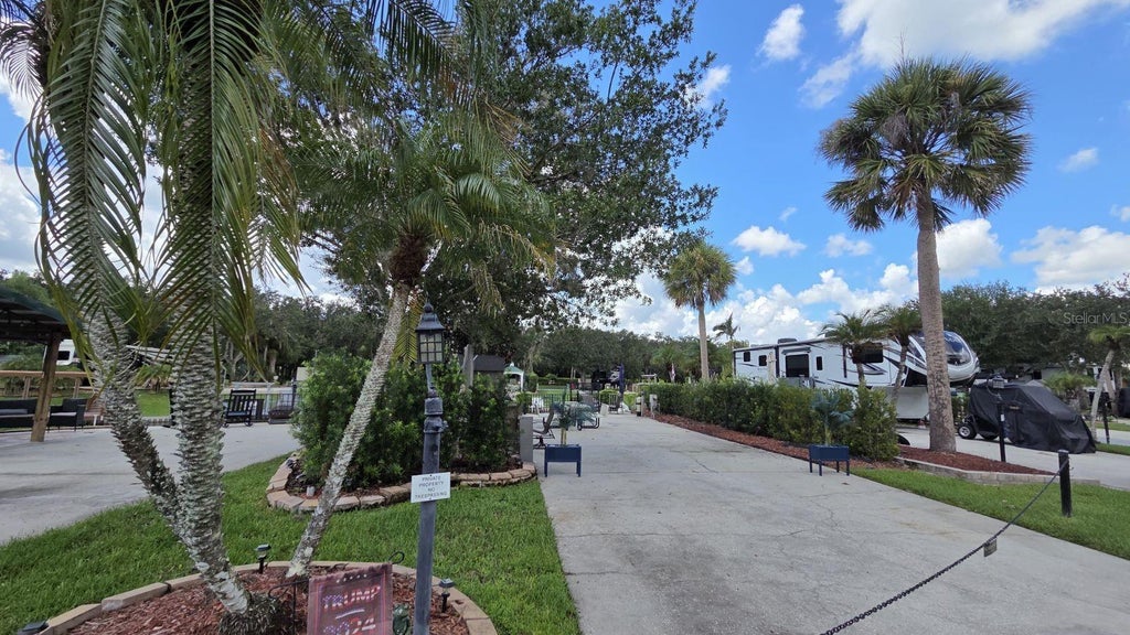 Photo of 579 Waterway Drive, River Ranch, FL 33867 (MLS # TB8524842)
