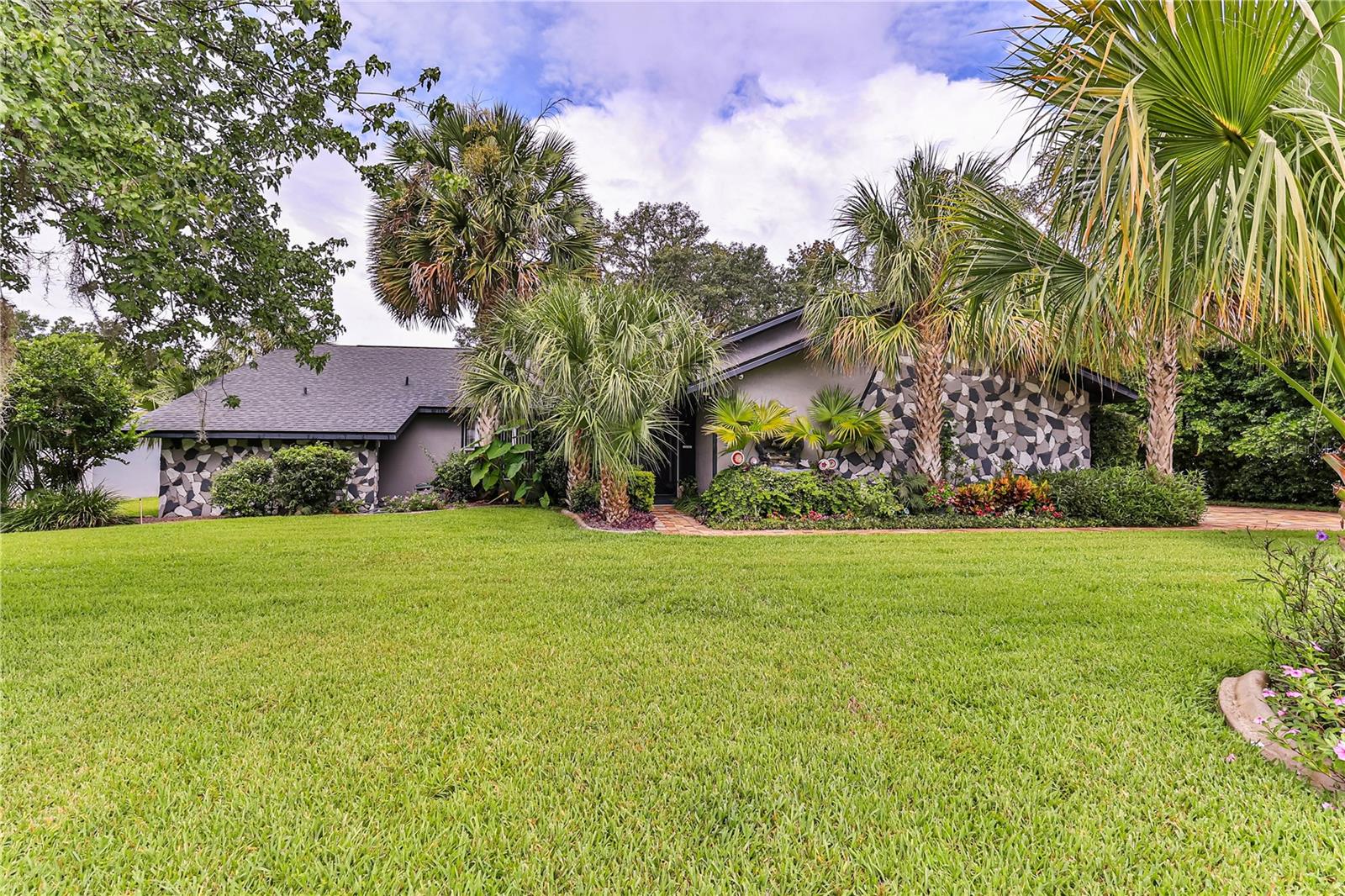 Welcome to your dream home in the heart of Inverness! Everything you could ask for! Nestled on a spacious half-acre lot in a peaceful and well-kept neighborhood. This beautifully maintained 4-bedroom, 2-bathroom residence offers comfort, style, and outdoor living at its finest. Step inside to find a bright and inviting layout, featuring a large living area with electric fireplace, perfect for family gatherings and entertaining. The updated kitchen boasts ample counter space, modern appliances, wood cabinets with roll outs, granite, and a cozy breakfast nook overlooking the pool area. The split floor plan offers privacy, with a spacious primary suite complete with an en-suite bathroom with jetted tub and generous closet space. Three additional bedrooms provide flexibility for guests, a home office, or a growing family. Enjoy Florida living on your enclosed patio, year-round with your own private inground pool, (which was completely updated 1 yr ago) great for cooling off on warm summer days or hosting weekend BBQs. The backyard offers plenty of space for gardening, play, or simply relaxing under the shade of mature trees. Additional features include being on a cul-de-sac, rood 2022, WH 2025, a two-car garage, HUGE indoor laundry room with storage, RO in kitchen, water system, and a quiet, established neighborhood close to schools, parks, lakes, and downtown Inverness amenities. Don't miss this rare opportunity to own a beautiful home with room to spread out – schedule your private showing today!