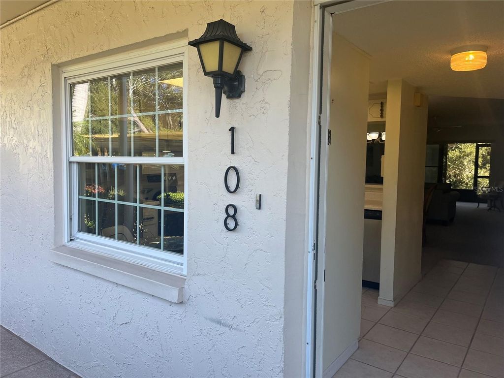 Photo of 840 Virginia Street #108, Dunedin, FL 34698 (MLS # TB8439116)