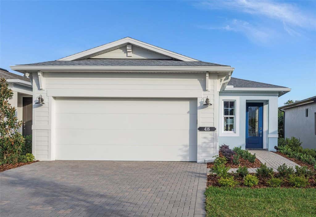 Photo of 419 Verona Way, Lady Lake, FL 32159 (MLS # W7888741)