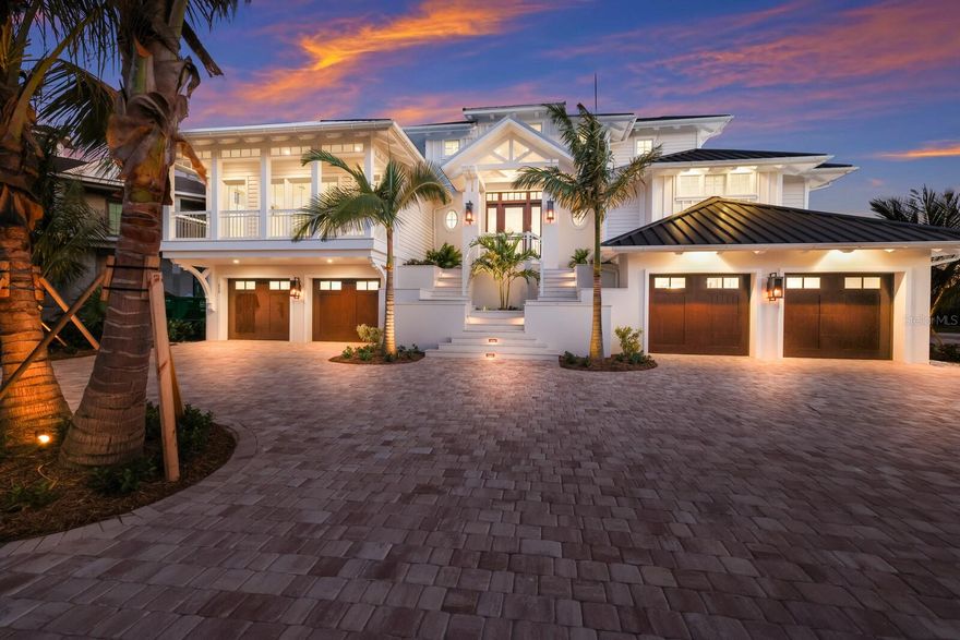 Brand New Construction ready to enjoy! ‘Casa Del Marae’ is majestically positioned along the pristine beaches of Boca Grande Pass. Its unique southern exposure will provide full sun and light in the winter months and beautiful sunsets over the Gulf of Mexico. Relish in the amazing panoramic water & lighthouse views, abundant sea life, and a front row seat to every Tarpon caught in Boca Grande Pass. The owners creative vision for this traditional coastal estate was brought to life by MHK Architecture and constructed by BCB Homes. With 5,700 + square feet of living space and over 12,000 total square feet this spacious estate has everything a selective Buyer would appreciate. The generous floor plan will offer 4-bedroom ensuites, an exercise room that could also serve as an additional bedroom, a top level viewing lounge, and a roomy media room with private balcony. Designed for the ultimate entertainment and family gatherings, this luxurious interior layout will present a must see double sided kitchen with fully equipped chef’s galley, prep area, and butler’s pantry. Wolf and Sub zero appliances will adorn this elegant kitchen together with custom high end wood cabinetry by Ruffino. Additionally, a built in wine chiller will be highlighted by a classic glass lit cocktail cabinet and wine rack. Master carpentry is presented in nearly every room with custom wood cladded ceilings and creative beam details complimented by white oak wood flooring and meticulously crafted trim & hardware. The exquisite VIP Suite will surely impress and provide elegance and solitude with exceptional water views and direct access to the spa & pool. Relax in the lush bath enclave with free standing Oceania tub and a showcase walk in shower offering double rain head controls. Custom double vanities with makeup counter, coffee cabinet, and built in closets will also be included. The massive 4 door garage and storage on lower level boasts over 4,700 square feet of vehicle parking and tons of extra space for all the toys. Outdoor living will be just as exceptional showcasing a summer kitchen with Alfresco grill, a fireplace with built in flatscreen tv, and a beautiful elevated heated pool & spa with decorative fire bowl water features. In addition, the guest wing will offer an open viewing terrace conveniently accessed by the lounge and suites. The exterior construction is next level and designed to protect against the harshest of elements. Remote control shutters and bug screens can be conveniently deployed to protect the outdoor living areas together with hurricane rated impact glass and doors installed throughout all openings. The generator ready home also features a full size elevator servicing all floors providing convenience and peace of mind through ownership. Location is exceptional with direct access to the private East beach, public beach, and a private fishing pier exclusive to this high end gated community.