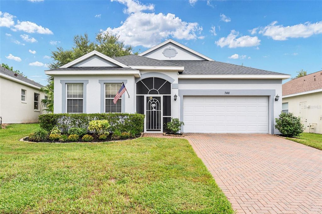 Photo of 748 Summit Greens Boulevard, Clermont, FL 34711 (MLS # O6347850)