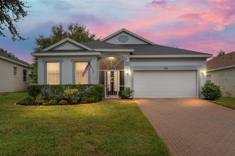 Photo of 748 Summit Greens Boulevard, Clermont, FL 34711 (MLS # O6347850)