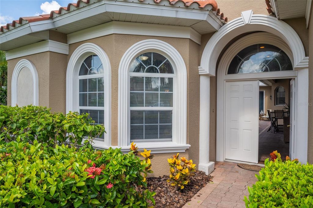 Photo of 303 9th Avenue E, Palmetto, FL 34221 (MLS # A4658399)
