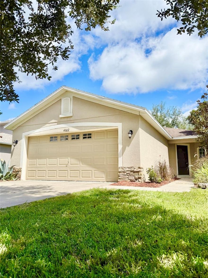 Welcome to this 3-bedroom, 2-bathroom home offering 1,282 sq. ft. of living space in the desirable Country Walk community of Wesley Chapel. The split-bedroom floor plan features a bright living/dining room combination with vaulted ceilings and wood-look vinyl flooring. The open kitchen boasts stainless steel appliances, granite countertops, tile backsplash, wood cabinetry, a breakfast bar, eat-in nook with a window seat, and tile flooring. The spacious primary suite includes a walk-in closet and ensuite bath with a cultured marble vanity, tile floors, and a tub/shower combo. Two additional bedrooms provide ample closet space and share a full guest bath with a linen closet. Additional highlights include decorative archways, plant shelves, a laundry area with washer and dryer, a 2-car garage, irrigation system, and a private back patio—perfect for relaxing or outdoor dining. Country Walk is a master-planned community featuring a 5,000 sq. ft. clubhouse with fitness center, playground, 2 pools, tennis and basketball courts, volleyball, and green space. Conveniently located near top-rated schools, Wiregrass Mall, Tampa Premium Outlets, hospitals, colleges, and major highways (I-75, I-275, SR-54, SR-56). This home offers comfort, style, and a fantastic location—schedule your showing today! $150 admin fee due prior to move in.