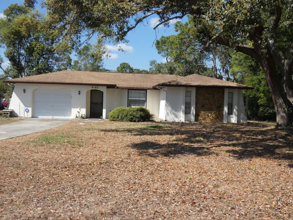 Under contract-accepting backup offers. Block 2 Bedrooms 2 Full Bathrooms, 1 Oversized Garage, Fenced area in backyard, Non Flood Zone, No HOA, No CDD, Corner lot: Only 1 bed room has carpet, Big Storage Shed in back @ 10 by 8: Less than 45 minutes to St. Pete Beach In Florida was just named The #1 Beach in America and the Fifth Best Beach In The World. Please view two videos: Tour 1 & Tour 2