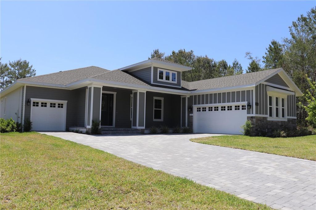 Photo of 6063 Dusk Rose Lane, Brooksville, FL 34601 (MLS # W7874861)