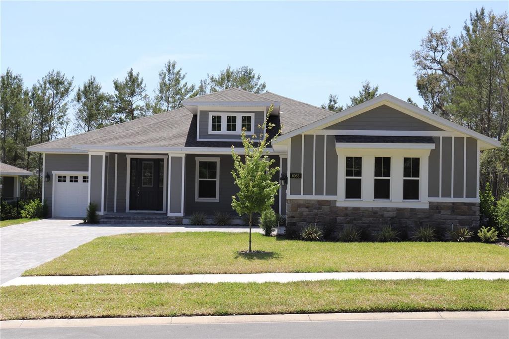 Photo of 6063 Dusk Rose Lane, Brooksville, FL 34601 (MLS # W7874861)
