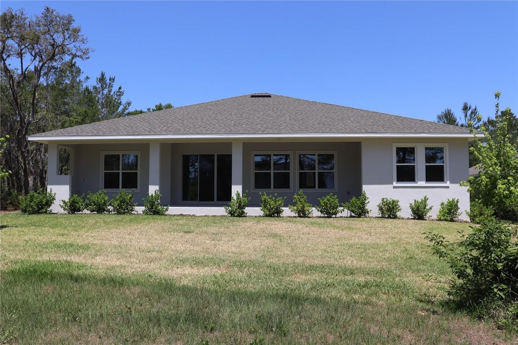 Photo of 6063 Dusk Rose Lane, Brooksville, FL 34601 (MLS # W7874861)