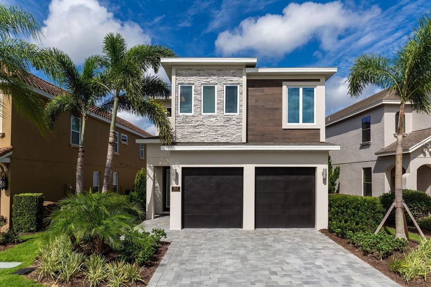 Welcome to 884 Golden Bear, a spectacular WATER FRONT 6 bed, 5.5 bath home with sweeping views of the pond and fountains on Golden Bear Drive, fully equip with TRANSFERABLE REUNION MEMBERSHIP! The property has a west facing pool which provides a great place to sit in the evenings and watch the glorious Florida sunsets. This home has a REUNION MEMBERSHIP giving access to the 3 championship golf courses, amazing waterpark, tennis courts, gym, crazy golf and other wonderful amenities, located just 7 miles from Disney. The open floor plan gives beautiful views out to the extended pool deck which has an enlarged pool, with sun shelf and spa. The light, bright kitchen has upgraded counters and tile, & cafe series appliances. The living dining area is spacious and provides multiple areas to sit, relax and eat. This property has been completely furnished by an interior designer and has tasteful decor and design in every area. There are TWO FULLY THEMED BUNK ROOMS featuring STAR WARS AND FROZEN, with a slide and gaming system, and if that's not enough the fun just keeps rolling with the fabulous MOVIE THEATRE AND ARCADE! There are two masters, one on the first floor and the second. They both have double vanities, & large showers. The master upstairs also has a tub, and a private rear balcony overlooking the beautiful pool deck and pond, providing a quiet area to sit and relax with your morning coffee or a cold glass of wine in the evening. This property has stellar rentals in place which can convey to the new owner.