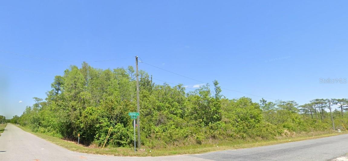 WOW! Oversized CORNER LOT 1.46 Acres of land in the Established Canaveral Acres of St. Cloud! Located on Topeka Ave and Denver Dr. Just off 192, This Spacious Parcel of Land Offers Endless Possibilities of Development or Investment! Whether You've Been Dreaming of Building a Florida Dream Home or Seeking a Lucrative Investment Opportunity, This Parcel is Ready for You! With 1.46 Acres of Land You'll have Plenty of Room to Create Your Dream Estate surrounded by Tranquility and Room for All Your Toys!! Canaveral Acres is the Perfect Place to Escape the Hustle and Bustle of the City While Still Being Within Reach of All the Amenities and Attractions that Central Florida has to Offer. Endless Outdoor Adventures Await in the nearby Harmony Community with golfing, hiking, and more. Not to Mention Sun & Sand at the Gorgeous Beaches just a short 30-minute Drive Away. Don't Miss Out on This Chance to Own a Slice of Paradise in Canaveral Acres on Double Lot 140 AND 141!! Buyer to confirm all data and conduct due diligence. Title is Clear and Ready to Convey.
