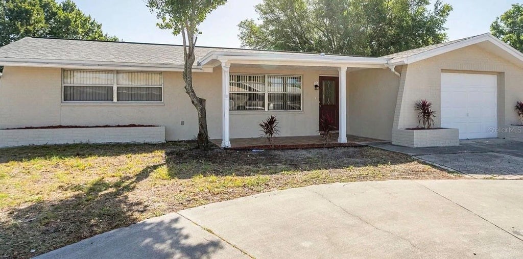 Photo of 8952 Sterling Lane, Port Richey, FL 34668 (MLS # TB8553128)