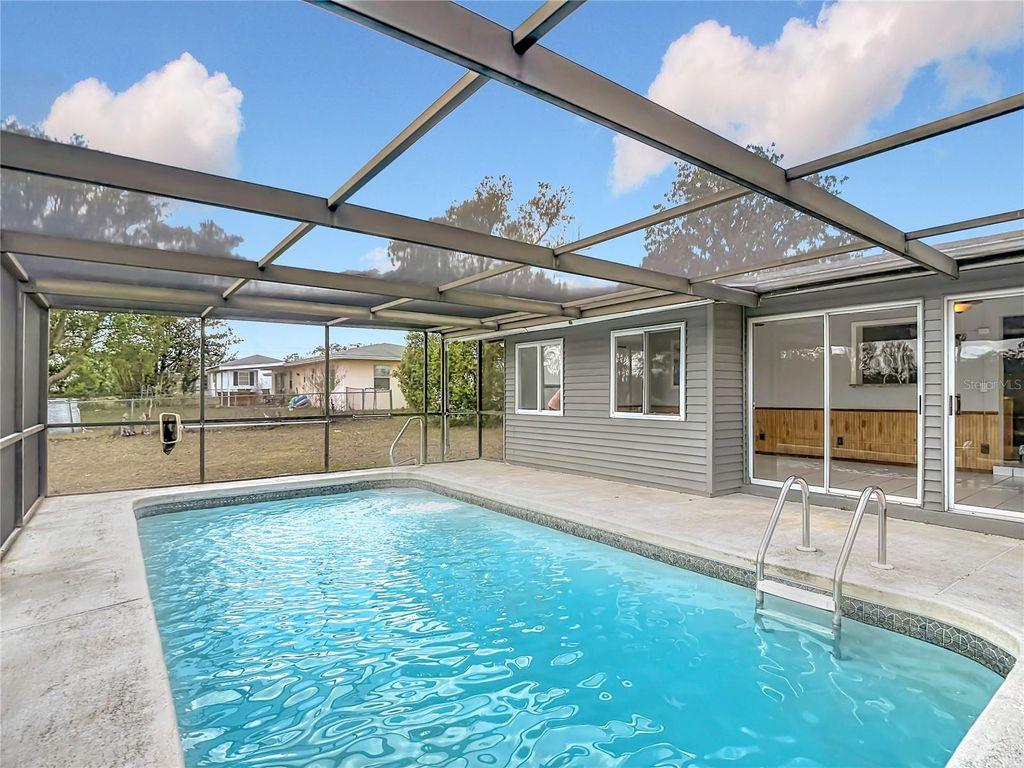 Photo of 1128 Trellis Avenue, Spring Hill, FL 34606 (MLS # TB8477574)