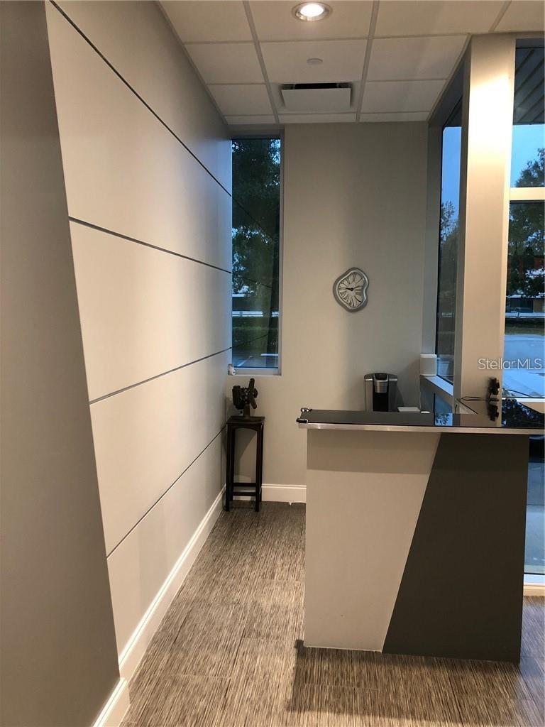 Photo of 6236 Kingspointe Parkway #6, Orlando, FL 32819 (MLS # O6443959)