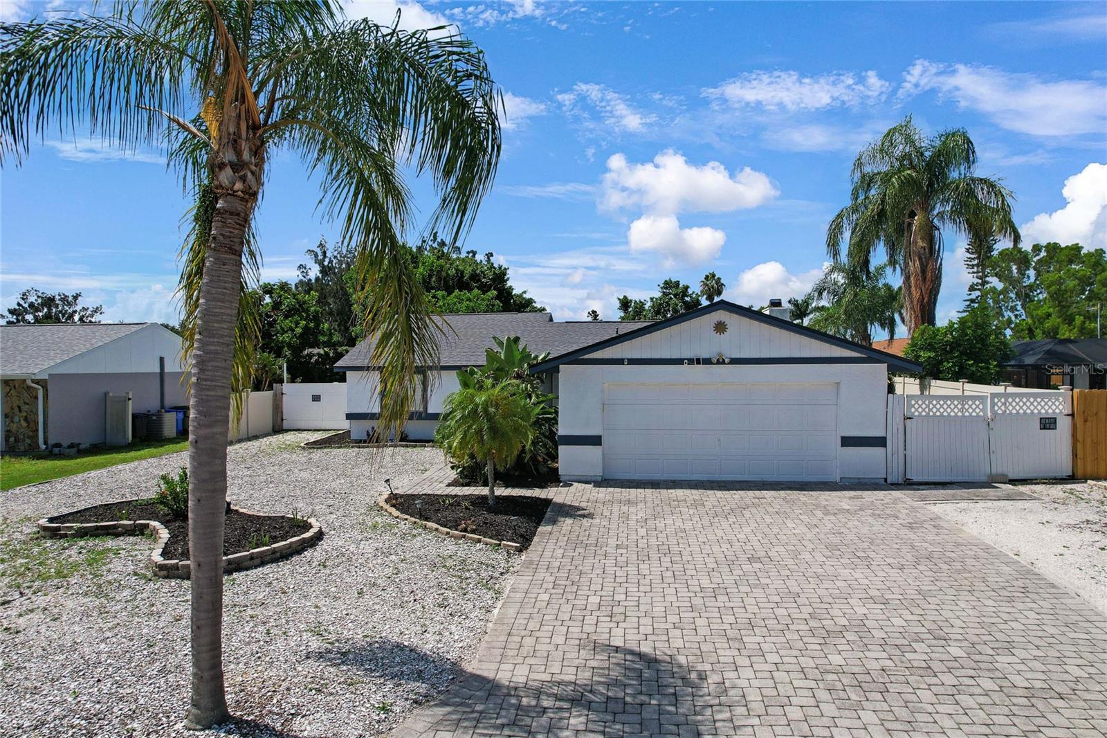 Your Florida POOLSIDE retreat awaits! This charming 3-bedroom, 2-bath home sits on an oversized, fully fenced lot—nearly a 1/4 acre—offering the space, privacy, and freedom you’ve been searching for. Located in a quiet, established neighborhood with NO HOA and NO rental restrictions, it’s just 10 minutes from the beach, shopping, dining, and entertainment.
Step outside and feel the breeze as you relax under the large covered lanai, perfect for entertaining or unwinding after a long day. The screened-in pool area lets you splash, soak, and savor the outdoors—bug-free and year-round in Florida’s sunshine.
Another feature is the 12x24 detached shed, originally built as a soundproof hurricane shelter. This structure is full of potential—ideal for a workshop, art studio, or private escape. With some TLC, it’s ready to be reimagined to suit your lifestyle.
Inside, the layout is warm and welcoming, with a brand new water heater and brand new roof (less than a year old) offers added peace of mind. Even better, the seller is including a ONE-YEAR WARRANTY to give you extra confidence in your purchase. Whether you're hearing the sounds of laughter poolside, feeling the sun on your skin, or envisioning your next project in the backyard, this home delivers a lifestyle that speaks to all the senses.
Don’t miss your chance to own this slice of Florida living—schedule your private tour today!