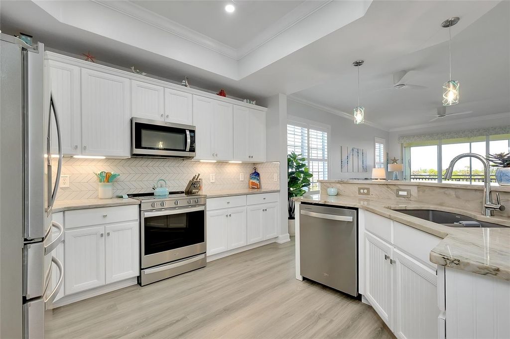 Photo of 10501 Amberjack Way #301, Englewood, FL 34224 (MLS # N6142365)