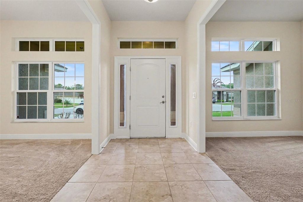 Photo of 1569 Lemon Ave, Winter Haven, FL 33881 (MLS # TB8490457)