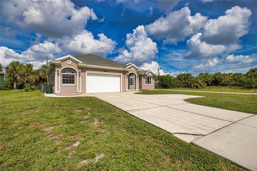 Photo of 2623 S Biscayne Drive, North Port, FL 34287 (MLS # O6329896)