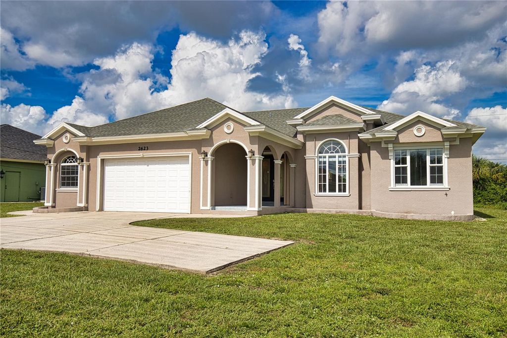 Photo of 2623 S Biscayne Drive, North Port, FL 34287 (MLS # O6329896)