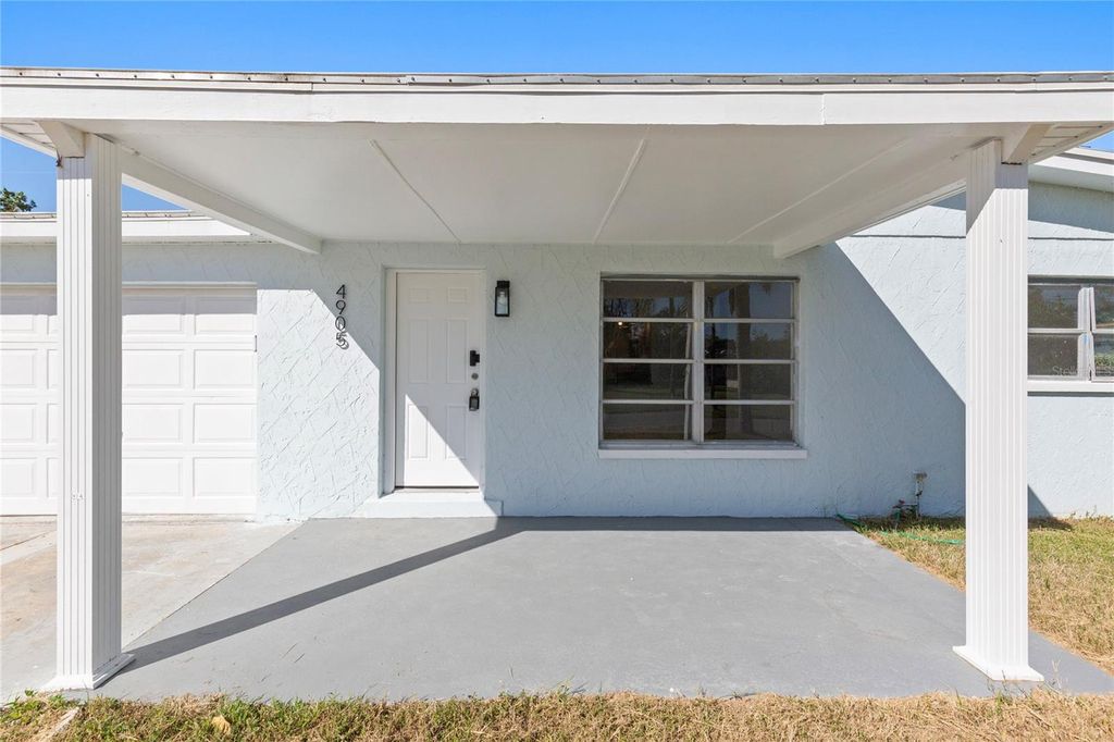 Photo of 4905 Largo Terrace, New Port Richey, FL 34652 (MLS # TB8441978)