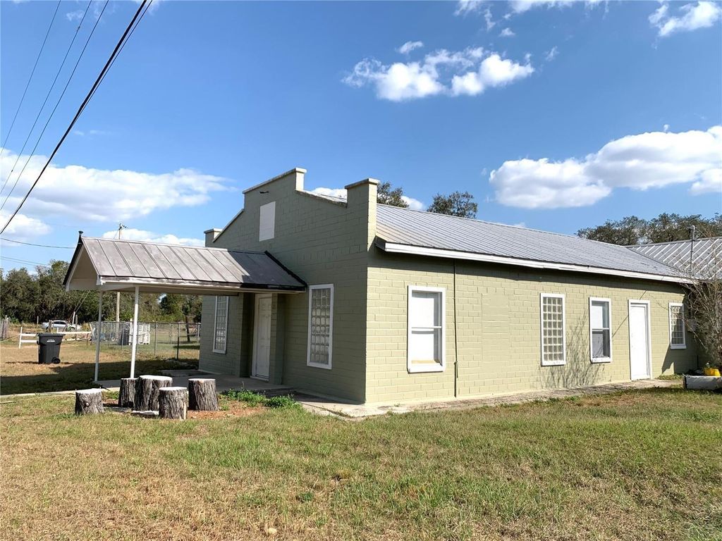 Photo of 100 John Street, Frostproof, FL 33843 (MLS # O6372959)