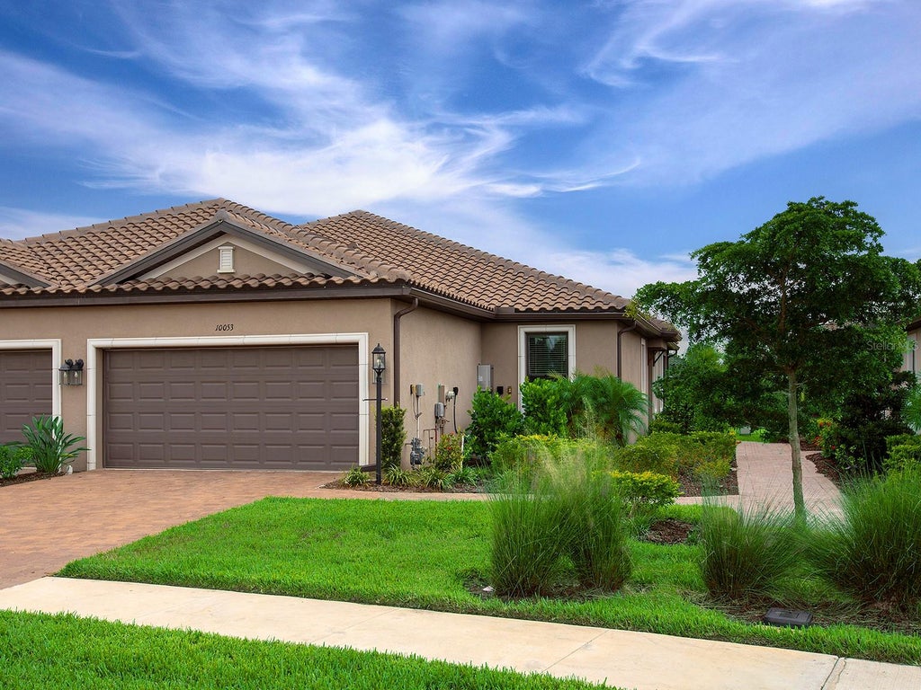 Photo of 10053 Morning Mist Lane, Sarasota, FL 34241 (MLS # A4704278)