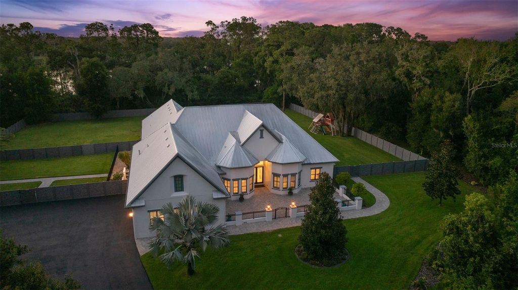 Photo of 8625 Tarpon Springs Road, Odessa, FL 33556 (MLS # TB8411047)