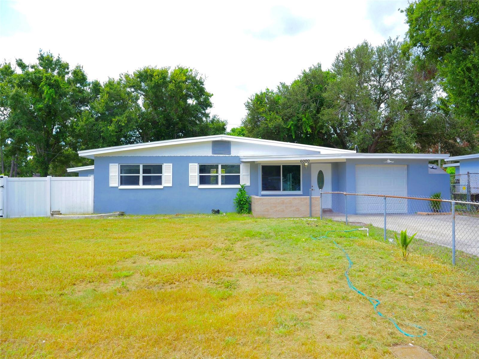 Here we have a spacious 4-bedroom, 2-bathroom, 1 car garage home on an over-sized corner lot.
This home features ceramic tile throughout, updated kitchen with granite countertops,
stainless appliances and breakfast bar. Large master suite with dual sink vanity,
jacuzzi tub and tile shower. This home also has a utility/laundry room, and a
detached 11 x 14 workshop. Brand new 2025 roof. Located close to everything St.
Petersburg and the Tampa Bay area has to offer.