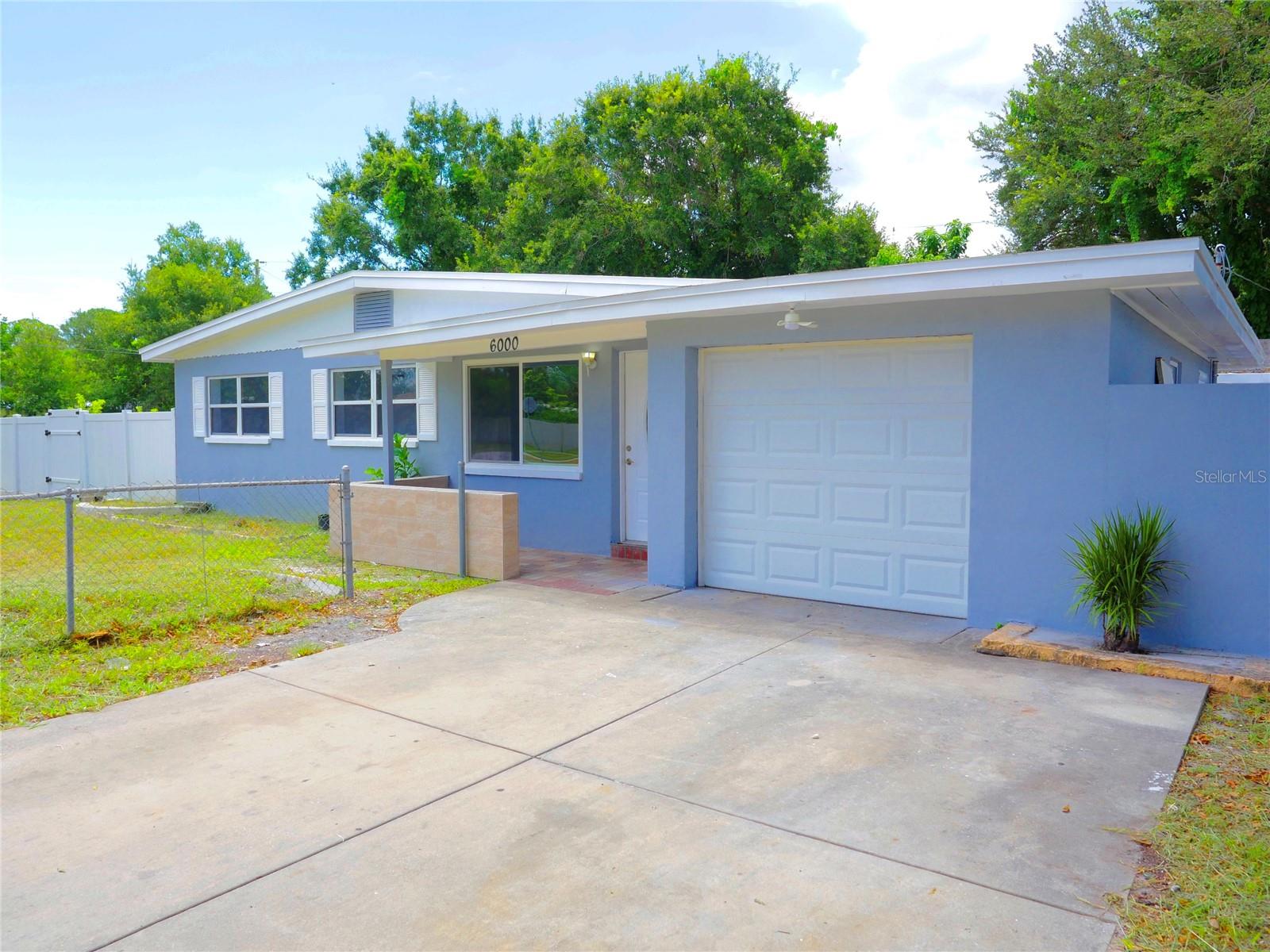 Here we have a spacious 4-bedroom, 2-bathroom, 1 car garage home on an over-sized corner lot.
This home features ceramic tile throughout, updated kitchen with granite countertops,
stainless appliances and breakfast bar. Large master suite with dual sink vanity,
jacuzzi tub and tile shower. This home also has a utility/laundry room, and a
detached 11 x 14 workshop. Brand new 2025 roof. Located close to everything St.
Petersburg and the Tampa Bay area has to offer.
