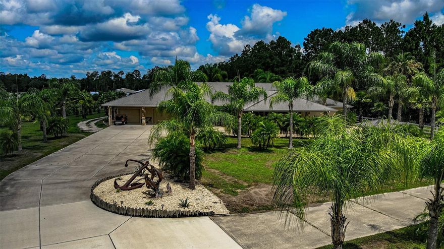 Enjoy all life has to offer in your 10 acre country estate located 15 minutes from the beaches of New Smyrna, the shopping of Port Orange, and with Orlando being less than an hour away. Room for all of your animals and toys with out buildings for all of your livestock and storage needs. This custom built pool home has an open floor plan with split 3 bedrooms set up with an ensuite bathroom in each bedroom. You can entertain your guests with a screened pool with a hot tub and pool side bar and a gazebo to enjoy the quiet country evenings. The indoors has a chefs kitchen, large dining area and a billiards room. ;Water: Available at Site