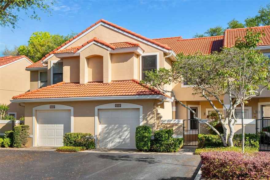 Welcome to Villas of Lake Destiny, a gated lakefront community tucked quietly in the heart of Maitland, offering a rare blend of privacy, natural beauty, and unmatched convenience. Residents enjoy a serene, low-traffic setting surrounded by mature landscaping, water features, and direct access to Lake Destiny, including a private community boat ramp, lakefront pool, and tennis courts. Located just minutes from I-4, the Maitland Exchange (414), Maitland Center, RDV Sportsplex, shopping, dining, and major employers, this community delivers an ideal balance of lifestyle and accessibility. This beautifully updated townhome features a private 1-car garage with gated courtyard-style entry, creating both security and a welcoming first impression. Inside, soaring ceilings and a transom window over the sliding glass doors fill the home with natural light, leading to a private screened patio that extends your living space outdoors. The main level showcases all tile flooring, a spacious open-concept living and dining area, and a well-appointed kitchen designed for both function and style. Features include upgraded white shaker cabinets with crown accents, subway tile backsplash, an extra-large stainless steel basin sink, glass cooktop with microwave hood, french door refrigerator, and pendant lighting over the breakfast bar. Upstairs and down, the layout offers flexibility and privacy with three generously sized bedrooms, each with ceiling fans and ample closet space. The oversized primary suite is a true retreat with two closets, including a walk-in, and a large ensuite bath featuring dual vanities, a walk-in shower, and a full wall vanity mirror. Additional highlights include brand new carpet, a 30-year tile roof replaced in 2023, HVAC system installed in 2020, modern brushed nickel fixtures throughout, and a versatile 9x9 bonus room with indoor laundry and washer/dryer included. Whether you are looking for low-maintenance living, proximity to everything Central Florida has to offer, or a quiet lakefront community to call home, this property delivers on all fronts. Contact listing agent to schedule your private showing today.