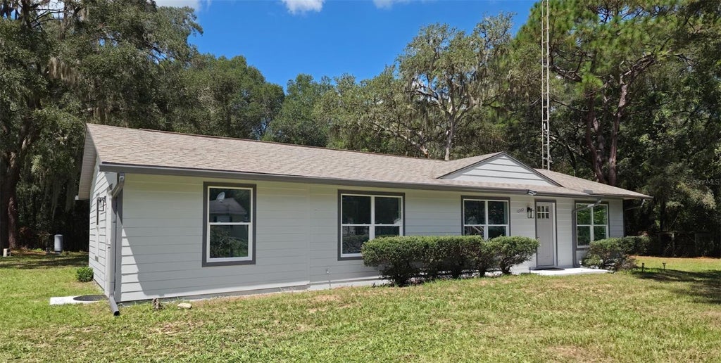 Photo of 10962 SW 112th Avenue, Dunnellon, FL 34432 (MLS # OM731586)