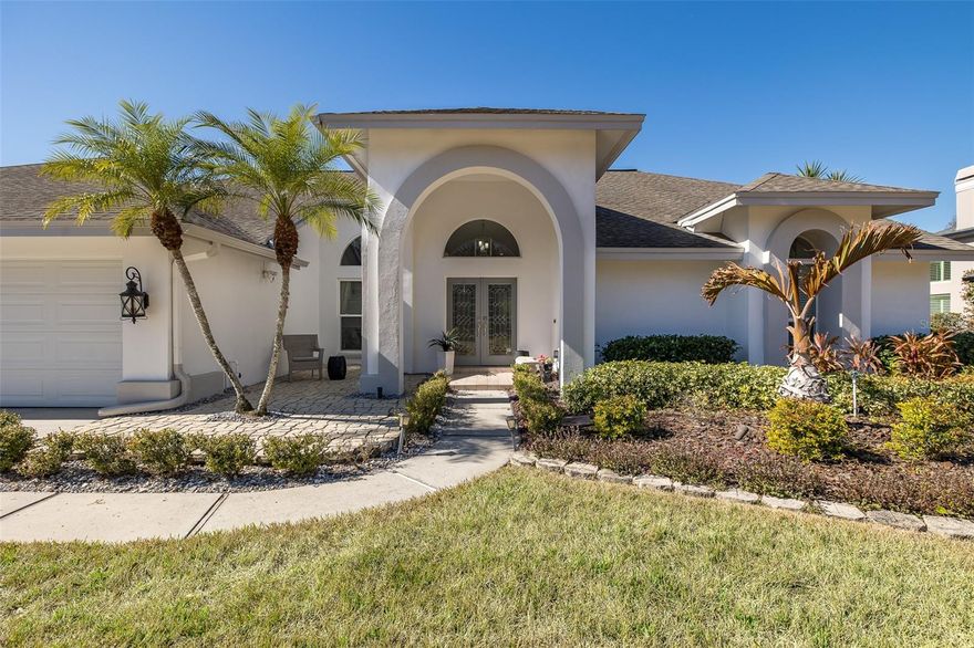 One or more photo(s) has been virtually staged. Welcome Home to Your Next Chapter

This stunning 4-bedroom, 3-bath, 3-car garage pool home with a spacious office blends style, space, and comfort in all the right ways. From the moment you step inside, you’re greeted by a bright, open layout filled with natural light—designed for both everyday living and unforgettable entertaining.

At the heart of the home, the kitchen impresses with modern finishes, generous counter space, abundant cabinetry, and seamless flow into the living and dining areas—perfect for hosting family and friends.

The thoughtfully designed three-way split floor plan offers exceptional privacy and flexibility. The primary suite, privately located at the front of the home, features a large walk-in closet and a spa-like en-suite with dual sinks, a separate vanity area, and plenty of room to unwind.

Two additional bedrooms and a full bath sit just off the kitchen, while the fourth bedroom is tucked beyond the living room with its own private bath and direct pool access—ideal for guests, teens, or multi-generational living.

Step outside into your own private backyard retreat—nestled on over half an acre of pure possibility. Start your mornings with coffee in the fresh air, spend weekends hosting unforgettable barbecues, and wind down with breathtaking sunset views.

With plenty of space to play, relax, and entertain, this expansive yard is the ultimate setting for making memories. Take a dip in the sparkling pool, unwind in the soothing spa, or gather with friends under the stars. Whether you’re hosting lively get-togethers or savoring peaceful evenings at home, this outdoor oasis truly captures the Florida lifestyle you’ve been dreaming of

Recent upgrades include:
• Newer windows and sliding door
2021 AC
• Stone flooring throughout main living areas
• Neutral interior paint & freshly painted exterior

Need even more space? A huge shed provides storage for lawn and pool equipment, and the expansive side yard features a fire pit with lighting—perfect for crisp nights under the stars.

This isn’t just a house—it’s the place you’ll call home.
Come see it for yourself and fall in love