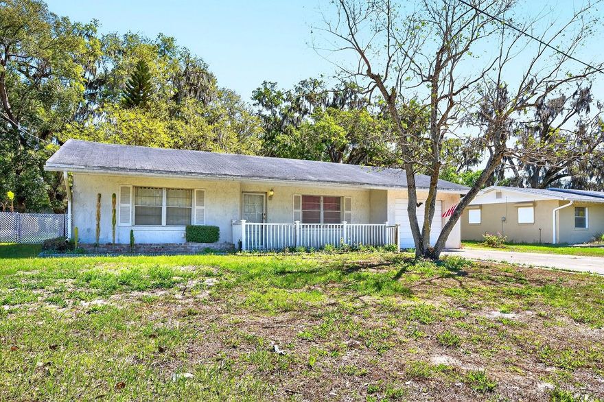 No HOA + Golf Cart District Living in the Heart of Sanford! Already done for you: NEWER A/C (2023), UPDATED ELECTRICAL (2023), and UPDATED PLUMBING – giving you peace of mind and a strong foundation in this solid 4-BEDROOM ~ BLOCK HOME in the established Sanford Park community! Set on a generous .26 ACRE LOT, this property offers a layout that lives comfortably with plenty of opportunity to personalize and make it your own. A covered front porch welcomes you inside where WOOD LAMINATE & TILE FLOORING throughout create a cohesive, low-maintenance interior. The main living area flows naturally into the dining space, where a French door leads to a large SCREENED LANAI – the perfect spot for morning coffee or relaxing evenings overlooking the backyard. The dining area connects easily to the kitchen, making everyday living and entertaining simple and functional. The SPLIT BEDROOM layout offers added privacy, with a true PRIMARY SUITE featuring its own en-suite bath and WALK-IN CLOSET, while the additional bedrooms are thoughtfully positioned at the back of the home. The EXPANSIVE BACKYARD is shaded by mature trees and landscaping, creating a peaceful setting with plenty of room for pets, play, gardening, or future outdoor upgrades. Much of the yard is already fenced and could easily be completed for full enclosure. Situated in Sanford’s sought-after Golf Cart District with NO HOA, you are just minutes from Historic Downtown Sanford, the Sanford Riverwalk, and Lake Monroe, where you can enjoy waterfront dining, breweries, festivals, and local shops. Bay Avenue Park is just up the street, offering green space and a playground, and you are conveniently located near SR 46, US-17, and the 417, as well as the Orlando Sanford International Airport for easy commuting. Zoned for “A” RATED SANFORD MIDDLE SCHOOL, this home offers excellent potential and opportunity in a great Sanford location – schedule your showing today!