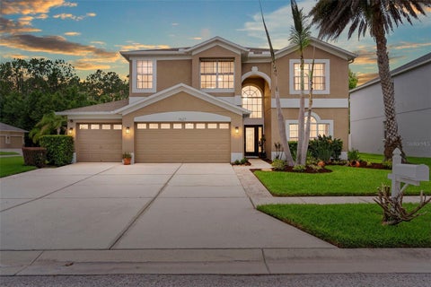 Photo of 7627 Rathdown Lane, Wesley Chapel, FL 33544 (MLS # TB8515559)