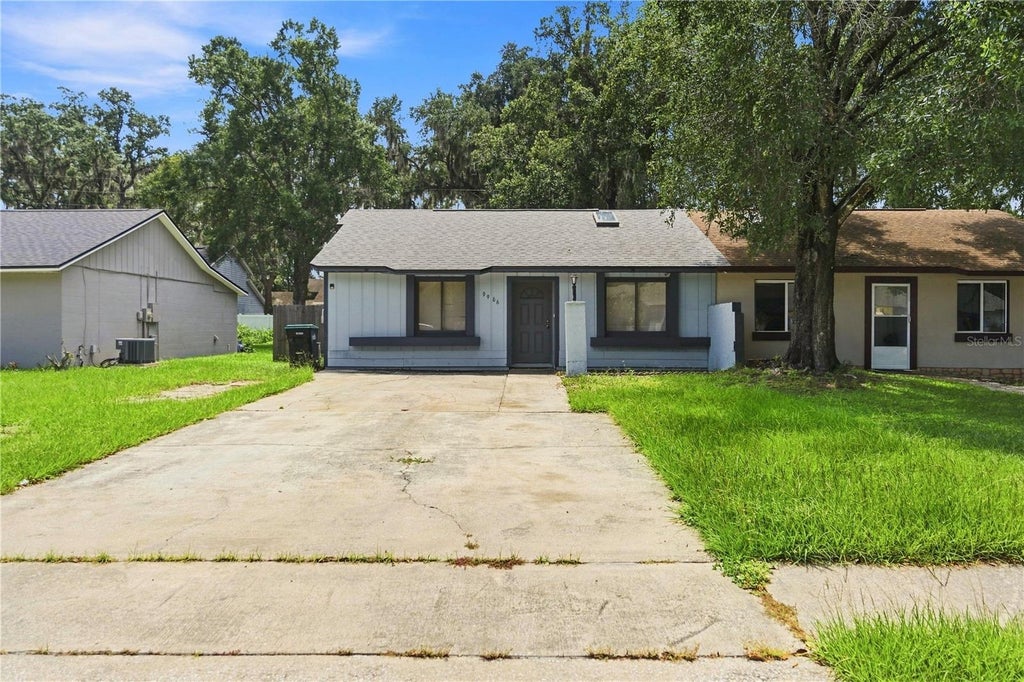 Photo of 9966 Burl Way, Orlando, FL 32817 (MLS # O6444166)