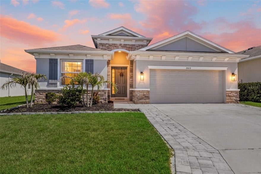 Experience elevated Florida living in this beautifully upgraded and highly sought-after Lantana model by D.R. Horton, ideally situated within the desirable Bay Landing community of Lakewood Ranch. Built for both comfort and style, this spacious 4-bedroom, 2.5-bathroom residence showcases a thoughtfully designed open-concept floor plan filled with natural light, soaring ceilings, and modern designer finishes throughout. From the moment you arrive, the home’s stunning curb appeal, upgraded exterior accents, paver driveway, and elegant architectural details create an unforgettable first impression.
Inside, the expansive gourmet kitchen serves as the heart of the home, featuring oversized quartz countertops, sleek cabinetry, stainless steel appliances, subway tile backsplash, recessed lighting, a walk-in pantry, and an impressive center island perfect for gathering and entertaining. The kitchen flows seamlessly into the spacious dining and living areas, creating the ideal setting for both everyday living and hosting guests. Large sliding glass doors open to the covered screened lanai, blending indoor and outdoor living while overlooking the private fenced backyard and peaceful preserve-style green space beyond.
The luxurious primary suite offers a relaxing retreat complete with tray ceilings, abundant natural light, a generous walk-in closet, and a spa-inspired ensuite bathroom featuring dual vanities, a large walk-in shower, and a separate soaking tub designed for ultimate relaxation. All four spacious bedrooms feature upgraded luxury vinyl flooring, offering both durability and warmth with absolutely no carpeting throughout the home. Thoughtful custom accents, upgraded lighting, stylish fixtures, and tasteful modern touches elevate every room and give the property a model-like feel.
Step outside to enjoy the extended screened lanai with upgraded screening, ample seating space, and tranquil backyard views perfect for morning coffee, outdoor dining, or relaxing evenings under the Florida sky. The fully fenced yard offers privacy, room to play, and endless possibilities for future outdoor enhancements.
Located in one of the most desirable areas of Sarasota and Lakewood Ranch, Bay Landing residents enjoy convenient access to Waterside Place, top-rated dining, shopping at UTC, entertainment, parks, golf courses, and some of America’s most beautiful Gulf Coast beaches. With easy access to I-75, this exceptional home offers the perfect balance of luxury, convenience, and the vibrant Lakewood Ranch lifestyle buyers are searching for.